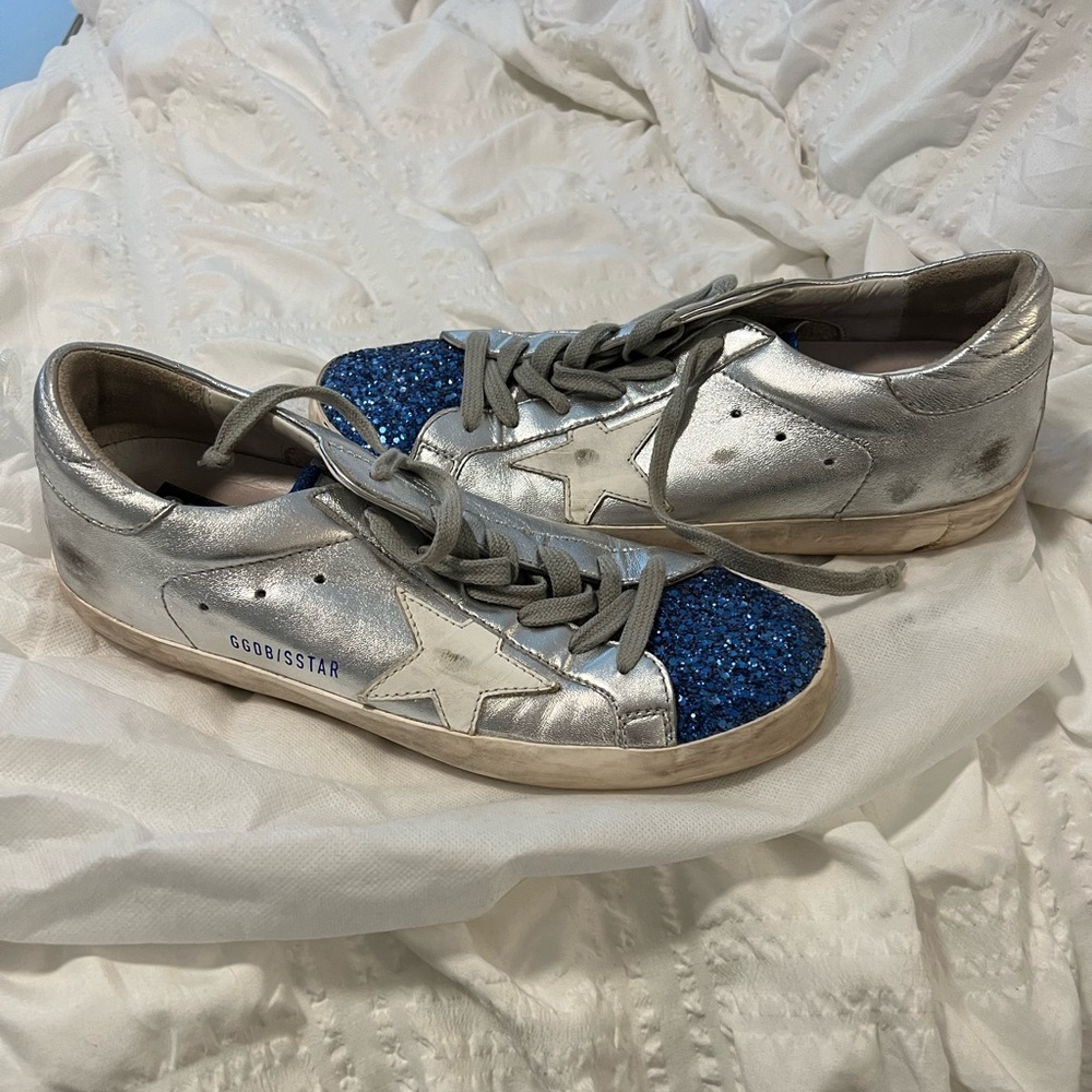 Barely worn Golden Goose superstar sneakers with blue sparkle front